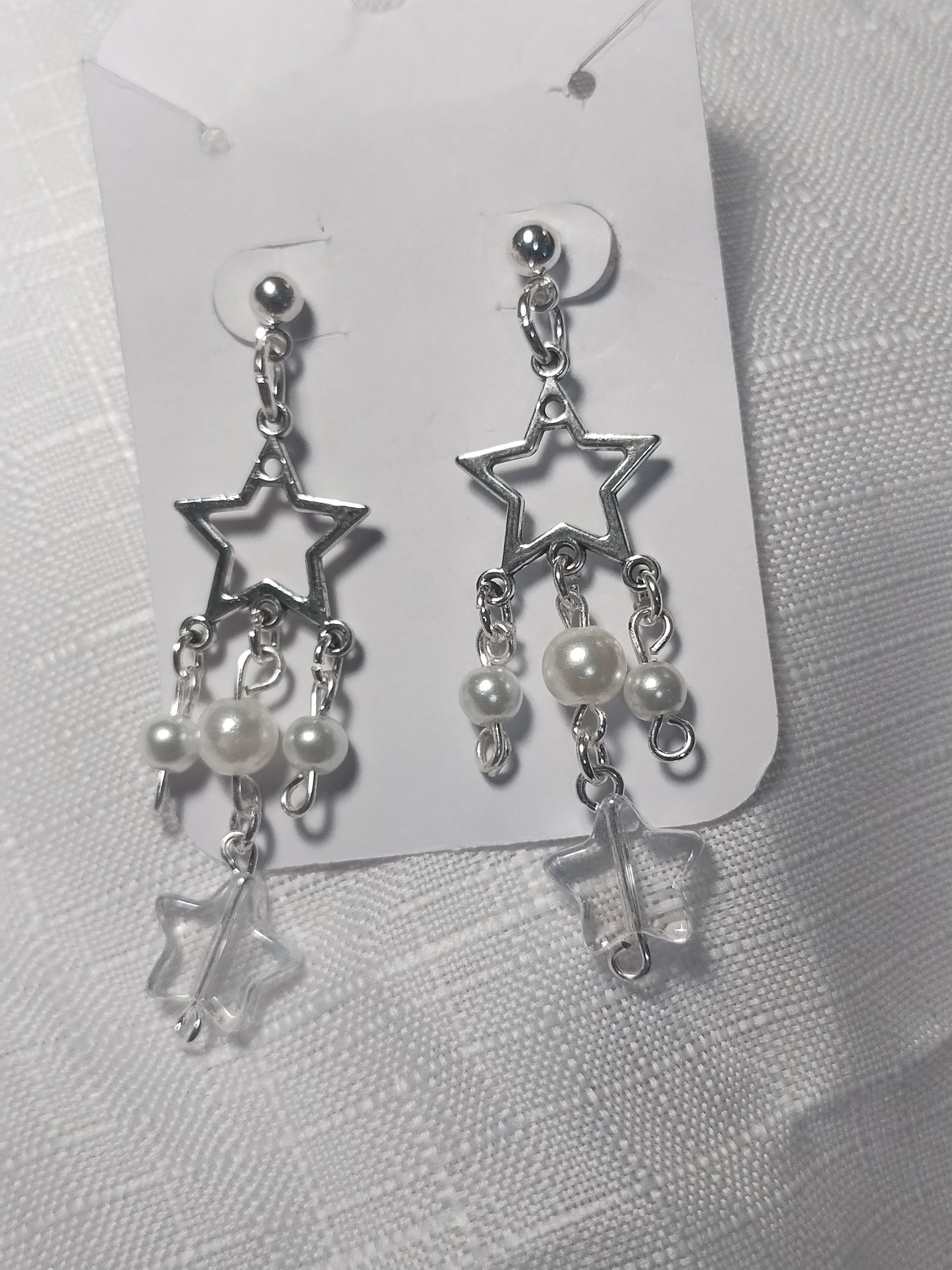 Star child earrings